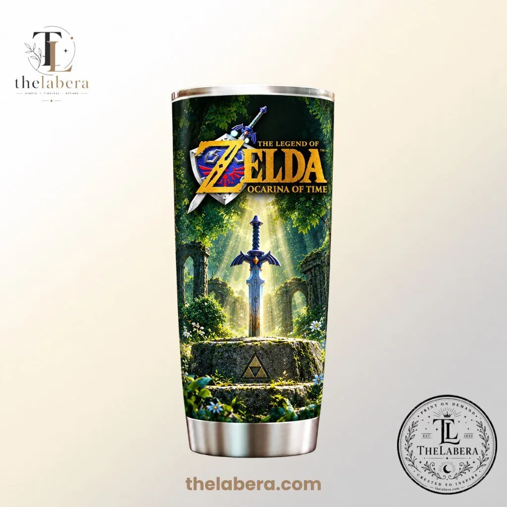 Legend of Zelda Ocarina of Time Tumbler 9 Stainless steel tumbler with Link and the gold The Legend of Zelda Ocarina of Time logo in a green forest scene